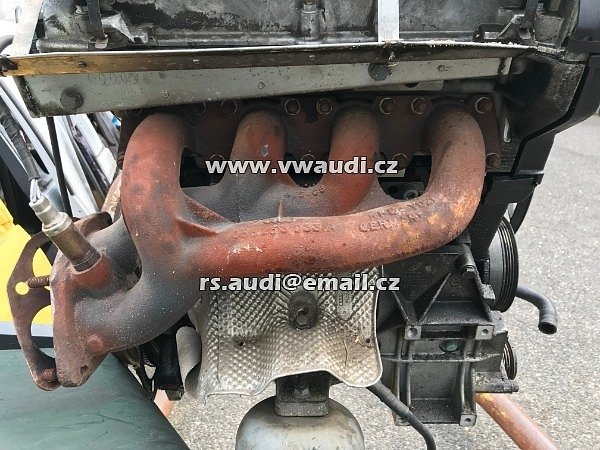058 253 033A Audi A4 B5 8D0 ADR 1,8 L  Svody výfuku   / parohy litinové svody první část výfuky motoru z hlavy  / - 6