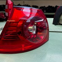 Levé vnější zadní světlo 1K6945095E / 028490102B VW Golf V 1K rok výroby 2005 - 2